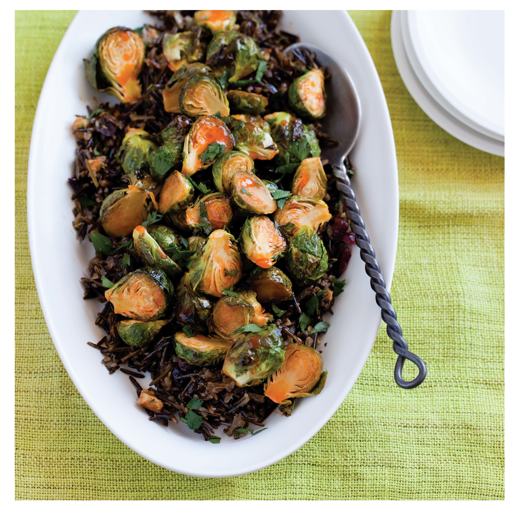 Maple-Sriracha Roasted Brussels Sprouts with Cranberry Wild Rice -- recipe from The Veggie-Lover's Sriracha Cookbook